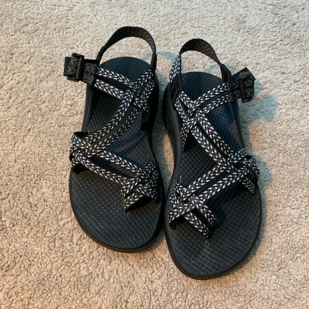 Black and white toe cross Chaco sandals